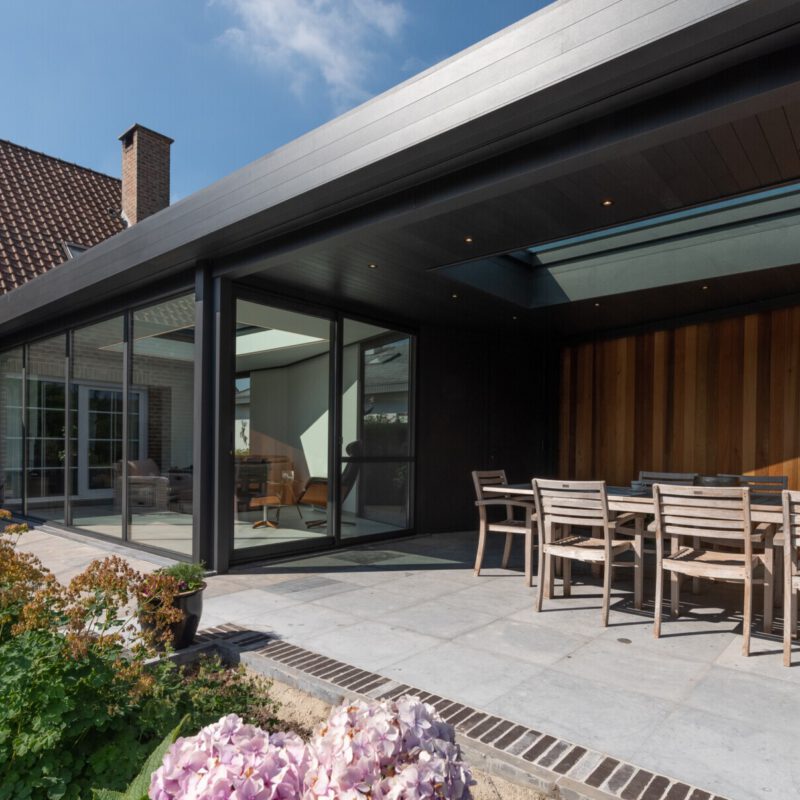 Moderne veranda aanbouw met overkapping in oostakker
