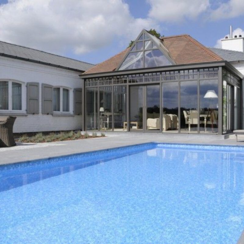 VDB landelijke veranda aanbouw met uitkijk op zwembad buiten
