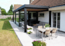 Moderne aanbouw veranda met terrasoverkapping in Blankenberge - Van Der Bauwhede