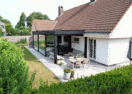 Moderne aanbouw veranda met terrasoverkapping in Blankenberge - Van Der Bauwhede