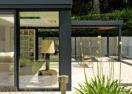 Véranda d'extension moderne à toiture de terrasse à Rhode-Saint-Genèse - Van Der Bauwhede