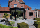 Moderne aanbouw veranda in Ninove vooraanzicht