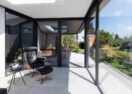 Moderne veranda aanbouw met oerkapping in Oostakker veranda binnen