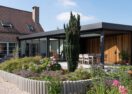 Moderne veranda aanbouw met overkaping Oostakker tuin planten