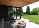 Moderne zwarte veranda aanbouw in Lokeren